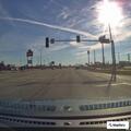 Officer checks white Toyota Highlander at Keller