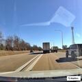 Truck with trailer parked on interstate without lights
