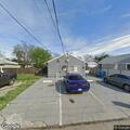 Man walking with two machetes near I Street unit