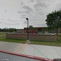 Car playing loud music at middle school lot