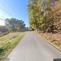 Tree and power lines blocking Lost Creek roadway