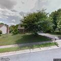 Residential alarm with unknown person in silver car