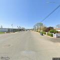 Driver fails to yield in black Nissan near Williams