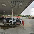 Traffic stop on black Jeep Cherokee at Speedway