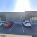 Person fallen with head injury on sidewalk in Riverside