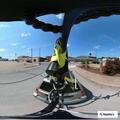 Officer checks semi truck with hazard lights on