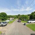 Person with back pain near Brookside Drive in Shinnston