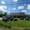 Four-wheeler rollover injures two near power sports shop
