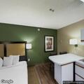 Person having trouble breathing at extended stay hotel