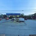 Fire crew checks trash burn behind gas station