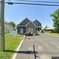 Person experiencing chest pain near Bayside Avenue