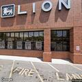Adult having seizure at Food Lion near school