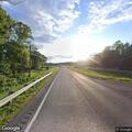 Traffic stop on motorcycle in road median