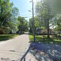 Aggressive dog chasing people near townhouse