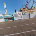 Person with ankle injury at arcade on boardwalk