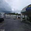 Dog left in car at hotel parking lot