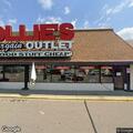 Officers check suspicious person behind store