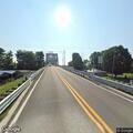 Hot water tank falls from vehicle on toll bridge