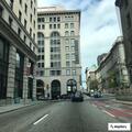 Person experiencing chest pain at office building