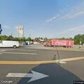 Officer serves warrant at store on Patrick Henry Way