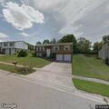 Man throwing items and pushing person at home