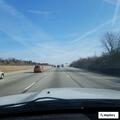 Unsafe pickup hauling unlit trailer on I-75