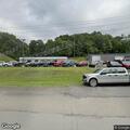 Unconscious man found in black truck at car lot