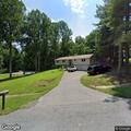 Man reportedly tries to run over dog at home