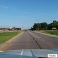 Traffic stop on black passenger car near high school