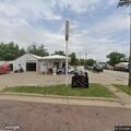 Officer checks on Short Stop employee at vehicle