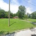Person experiencing difficulty breathing at home