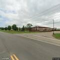 Traffic stop on maroon Chevy sedan