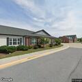 Person reporting chest pain at residential facility