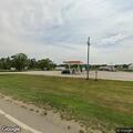Crash involving white van at gas station on US 24