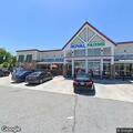Person experiencing back pain at Royal Farms store