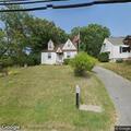Person experiencing abdominal pain near Ridge Road