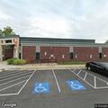 Child locked inside white car at White Marsh Library