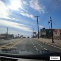 Suspicious SUV with flashing lights in shopping center