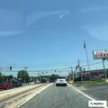 Elderly man in wheelchair struggles on ramp at Royal Farms