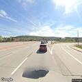 Disabled truck on shoulder of I-25 near Meadows Pkwy
