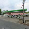 Male slumped over in truck at gas station