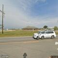 Traffic stop with blue Ford Bronco near visitor center