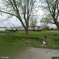 Mobile home fire with tanks and ammunition inside