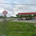 Woman removed for yelling at customers at gas station