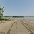 Officer runs records check at boat ramp