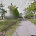Skid steer driven through yard on North First Street