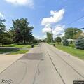 Stolen license plate on dark Jeep near Prairie Avenue