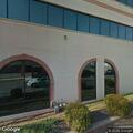 Person experiencing chest pain at medical suite