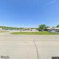 Traffic stop involving red Toyota van in lot