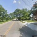 Traffic stop with records check involving a white minivan